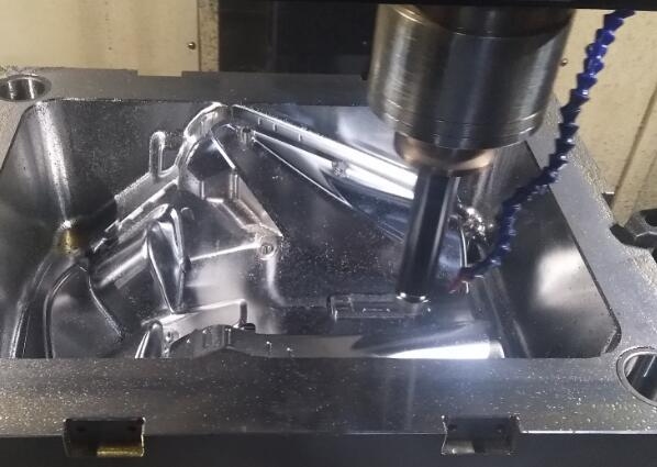 What is the difference between a turning and milling compound CNC lathe and a machining center?